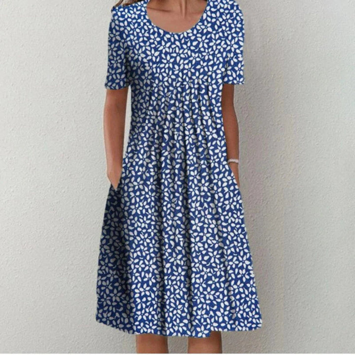 Blomstret Midi Kjole med Lommer | Casual Sommer-, Dimissions- & Strandkjole