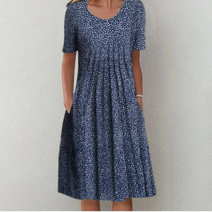 Blomstret Midi Kjole med Lommer | Casual Sommer-, Dimissions- & Strandkjole