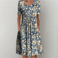 Blomstret Midi Kjole med Lommer | Casual Sommer-, Dimissions- & Strandkjole