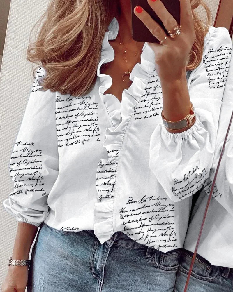 Enola | Feminin Bluse med Legende Flæser